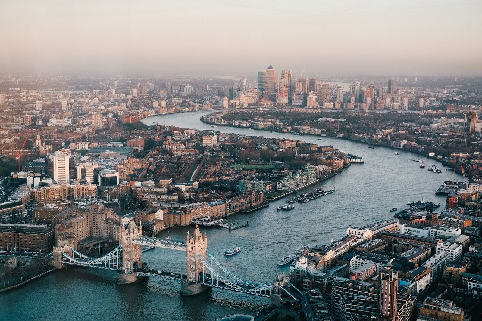 Aerial view of London at dusk with Tower Bridge and the Thames